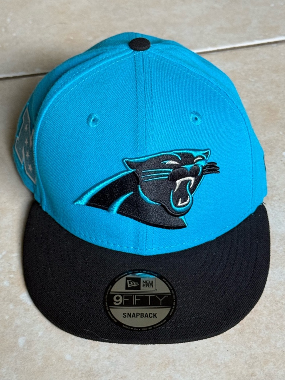 New Era Panthers Teal & Black 9FIFTY Snapback